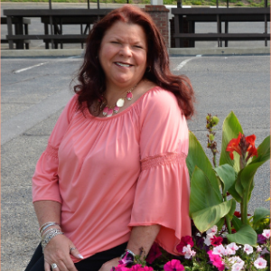 Angie Chewning, board member, sitting outside
